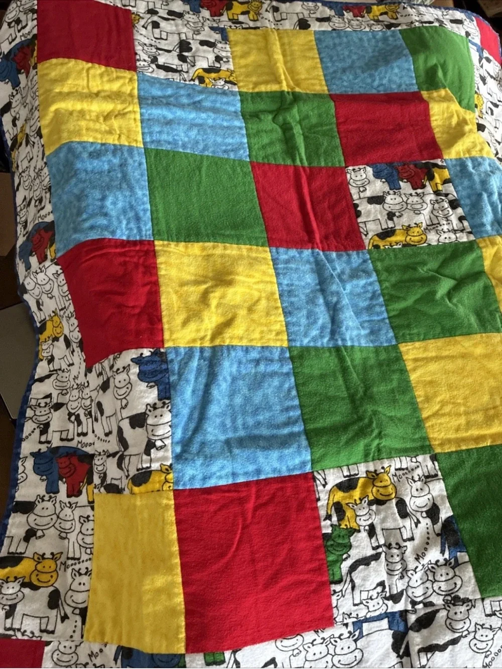 Multi-Color Patchwork Cow Print Baby Quilt - Red, Yellow, Blue, Green